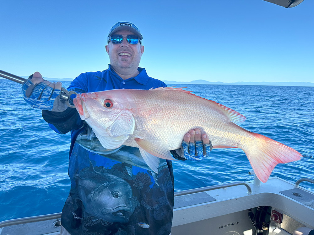 Angler holding a freshly caught fish